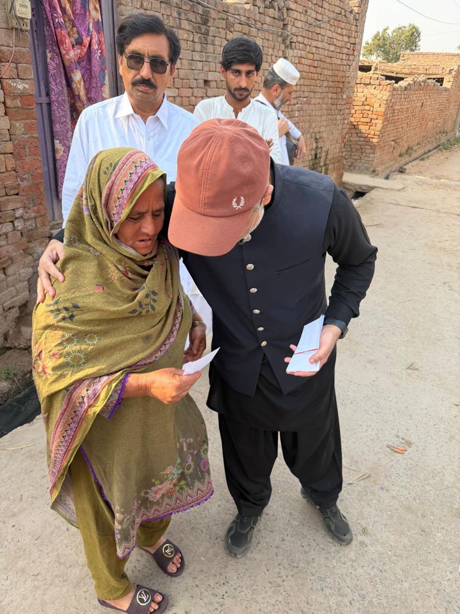 Field team meeting a supported family at their home